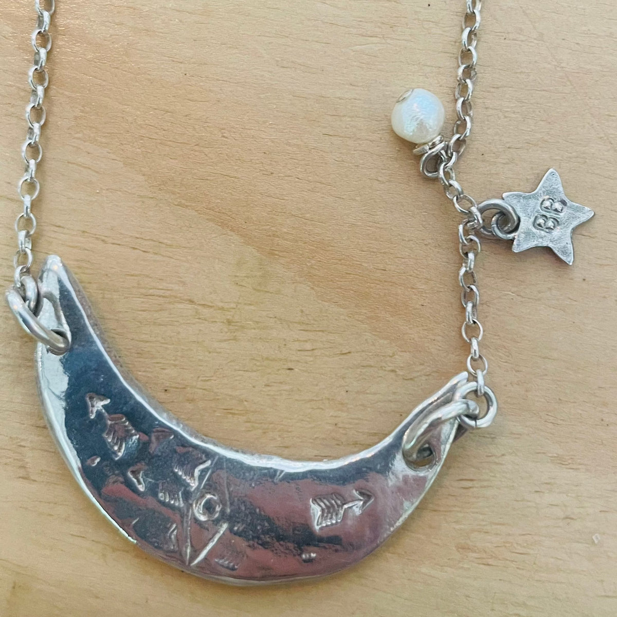 BRITT BOLTON / SILVER CRESCENT MOON W STAR & PEARL DETAIL